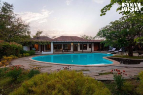 Wander Beyond by StayVista - Featuring a Bali-themed abode and a refreshing swimming pool